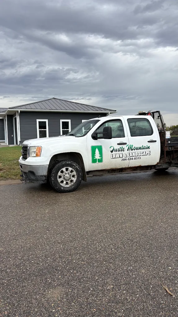 Turtle Mountain Lawn and Landscape branded work truck